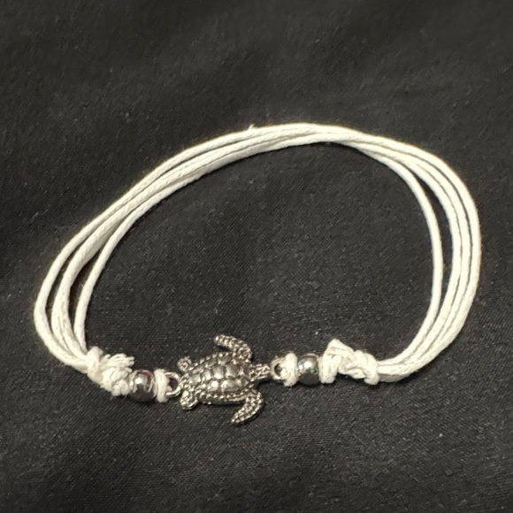 Jewelry - Silver Turtle Charm on White Bracelet